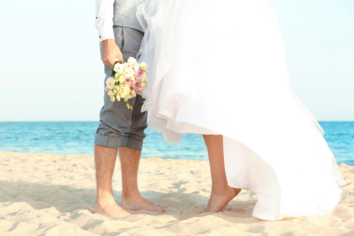 Happy Wedding Couple on Sea Beach